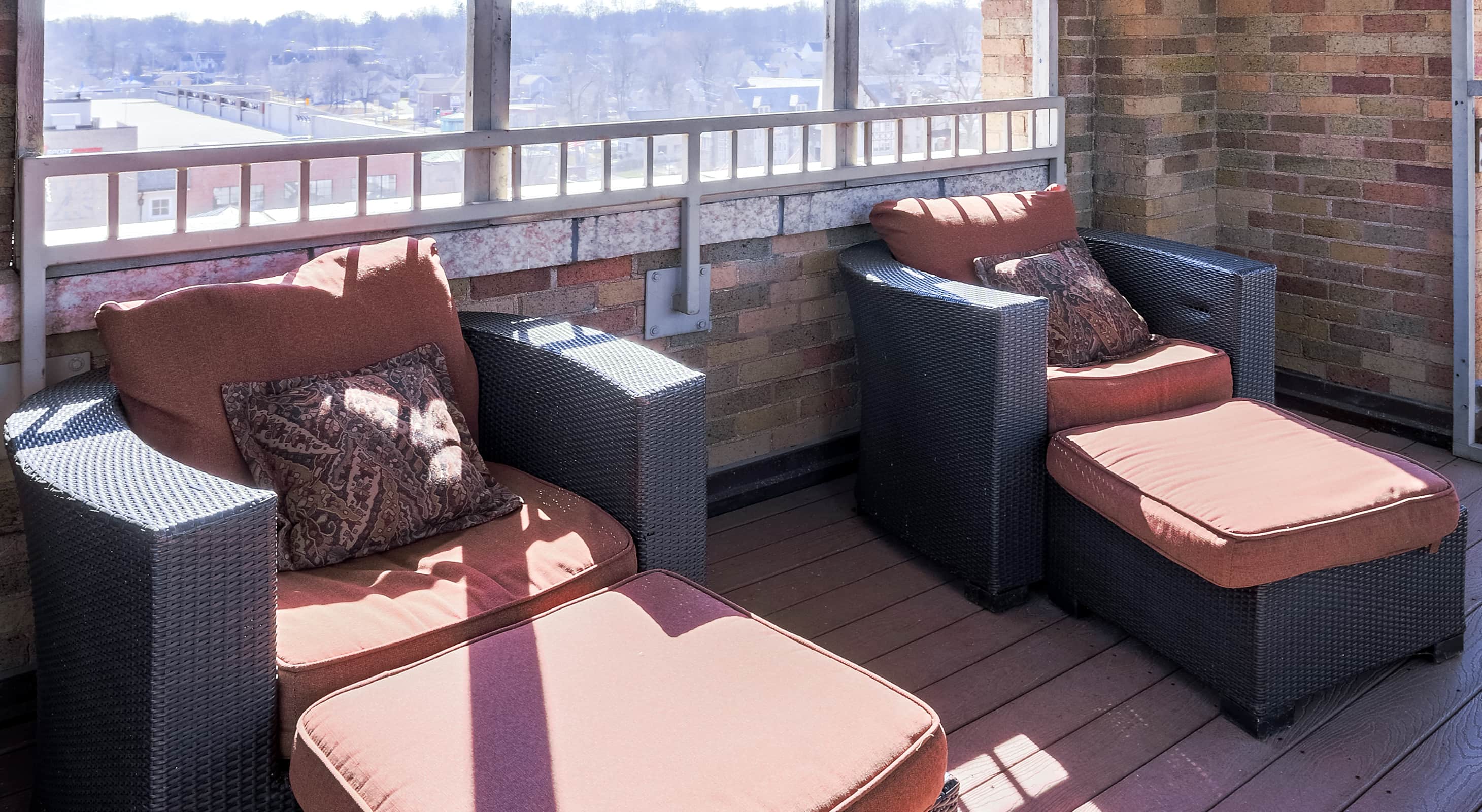 Seating area on rooftop patio of Penthouse Suite in our St. Charles, IL hotel and event venue