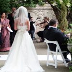 Bride walking down the aisle during a garden wedding at wedding venue near Chicago