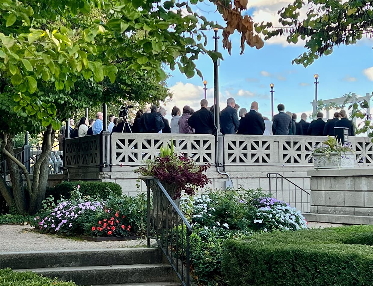 Wedding ceremony along the Fox River at the boathouse